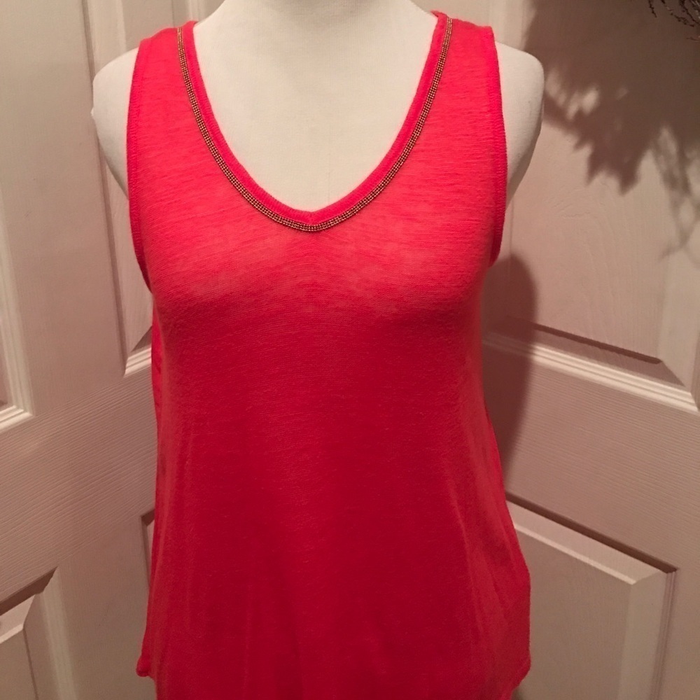 Orange sleeveless top with chain detail, cute back